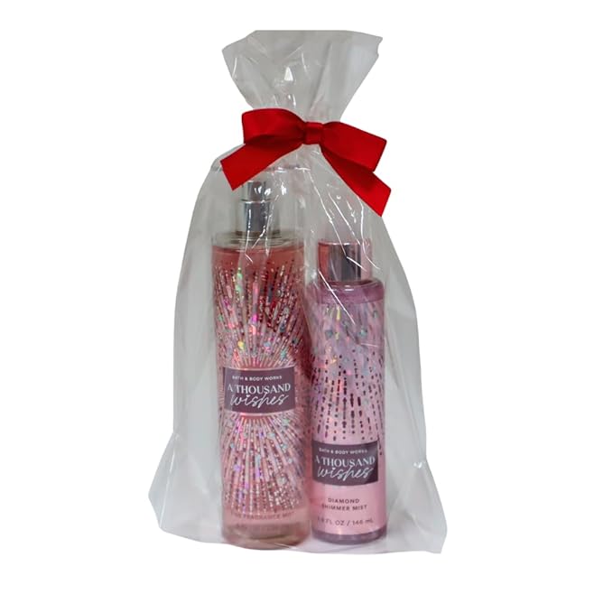 Bath & Body Works A Thousand Wishes Fine Fragrance Body Mist 8 oz & A Thousand Wishes Fine Fragrance Shimmer Body Mist 4.9 oz Gift Set packaging with a Red bow